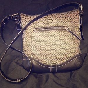 Coach Black and Gray side Crosby 👜